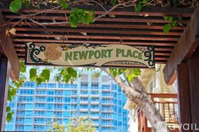 San Diego apartment for rent - A sign that says Newport Place is hanging from a wooden structure.