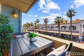 Imperial Beach condo for rent - A dining room with a table and chairs.