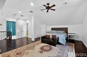 New Orleans house for rent - A dining room with a table and chairs.