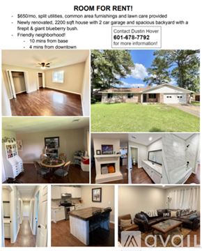 Columbus house for rent - A house with a garage is surrounded by a grassy lawn and trees.