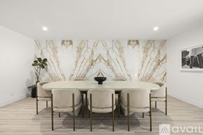 Los Angeles house for rent - A dining room with a white table and chairs.
