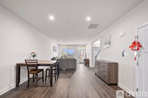 Frederick townhouse for rent - A dining room with a table set for four.