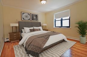 Brookline apartment for rent - a bedroom with a bed and a window