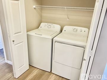 Spokane apartment for rent - A kitchen with a white dishwasher and a white refrigerator.