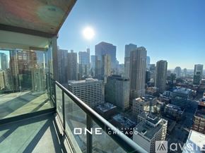 Chicago apartment for rent - A view of a city skyline from a high-rise building.