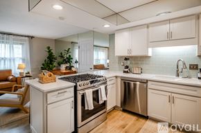 Lafayette house for rent - A modern kitchen with a stove top oven and a dishwasher.