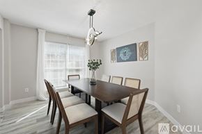Flower Mound house for rent - A dining room with a wooden table and chairs.
