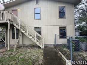 San Antonio apartment for rent - A house with a staircase leading to the front door.