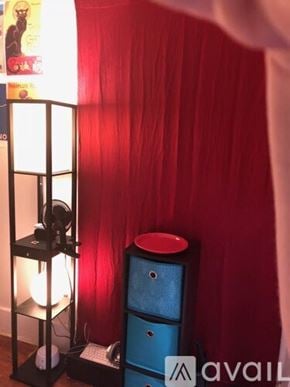 Brooklyn apartment for rent - A lamp with a light bulb inside is on a table.