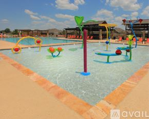 Lavon house for rent - A pool with a blue and red pole in the middle of it.