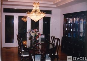Mercer Island house for rent - A dining room with a table set for six.