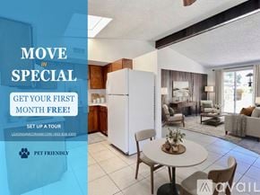 Phoenix apartment for rent - A kitchen with a sign offering a free first month for a move in special.