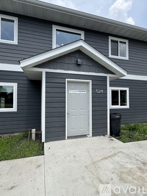 Nicollet apartment for rent - A grey house with the number 524 on the front door.