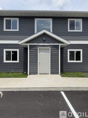 Nicollet apartment for rent - A grey house with the number 528 on the door.