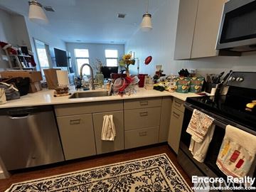 Brookline apartment for rent - A kitchen with a lot of counter space and a dishwasher.