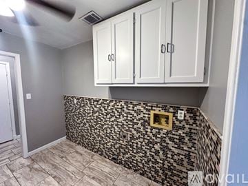 Lubbock house for rent - A white refrigerator stands in a kitchen with a white stove and oven.