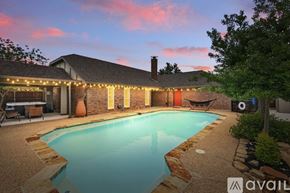 Keller house for rent - A house with a pool and lights around it.