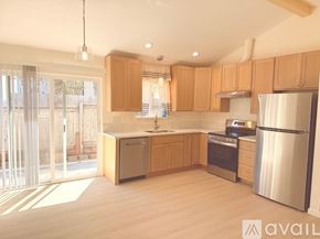 San Luis Obispo house for rent - A room under construction with a ladder and wooden walls.