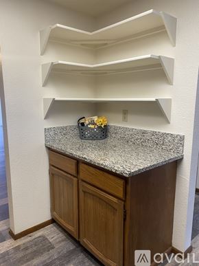 Salem apartment for rent - A living room with a fireplace and a television.