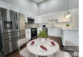 Crystal River house for rent - A modern kitchen with a dining table set for two.