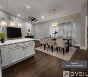 Crystal River house for rent - A modern kitchen with a dining table set up.