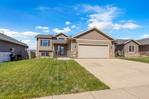 Sioux Falls house for rent - A row of houses with a clear blue sky above them.