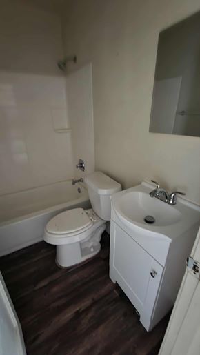 Killeen apartment for rent - A white toilet and sink in a small bathroom.
