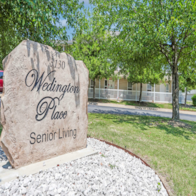 Fayetteville apartment for rent - A stone sign that says Wedington Place Senior Living.