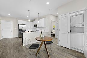 Newark apartment for rent - A modern kitchen with a dining table and chairs.