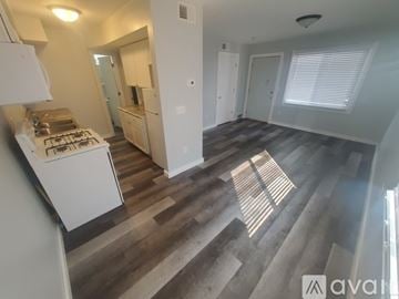 La Crosse apartment for rent - A kitchen with a stove top oven and a counter top.
