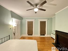 Cambridge apartment for rent - A room with a white door leading to a bedroom.
