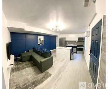 Cincinnati apartment for rent - A living room with a couch and a television set.