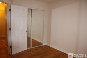 Kalamazoo apartment for rent - A room with a white door and a white wall.