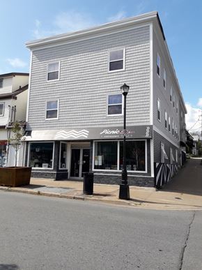 Dartmouth apartment for rent - A building with a sign that says "Piano" on it.