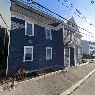 Salem apartment for rent - A blue house with white trim and a grey roof.
