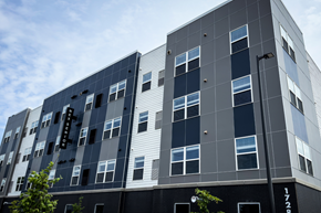 Fargo apartment for rent - A modern building with a black and white facade.