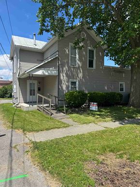 Findlay apartment for rent - A house with a grey facade is for sale.