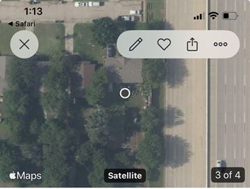 Oklahoma City house for rent - A satellite image of a location with a zoomed in area and a map icon.