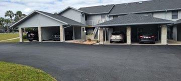 Hernando house for rent - A carport with three cars parked in it.