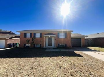 Oklahoma City house for rent - A house with a sunny sky above it.