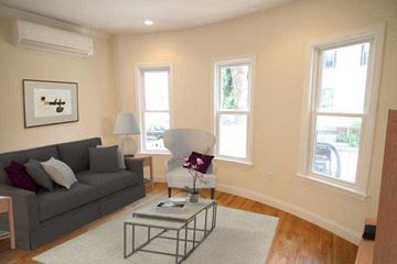 Cambridge apartment for rent - a living room with a couch and a table