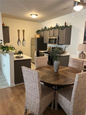 Boiling Springs apartment for rent - A kitchen with a table and chairs in the foreground.