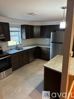Northford apartment for rent - A room with wooden flooring and a skylight.