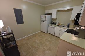 Birmingham apartment for rent - A kitchen with a table and chairs in it.
