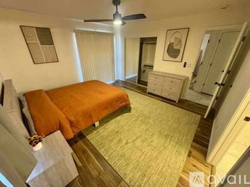 Kingman apartment for rent - A kitchen with wooden cabinets and a granite countertop.
