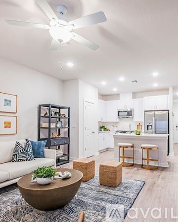 Wesley Chapel townhouse for rent - A kitchen with a table set for a meal.