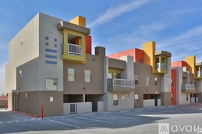 El Paso townhouse for rent - A modern apartment complex with balconies and multiple stories.