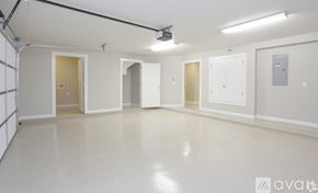 El Paso townhouse for rent - A spacious room with white walls and a grey floor.