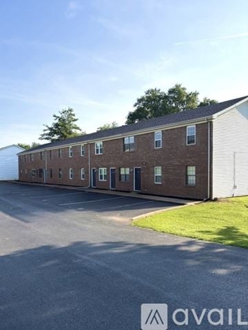 Bowling Green apartment for rent - A kitchen with black cabinets and appliances.