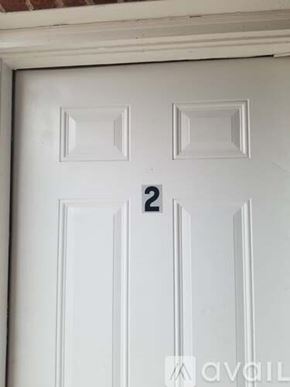 Pharr apartment for rent - A white door with a number 2 on it.